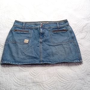 Bongo, denim mini skirt with zippered front pockets..junior size 9